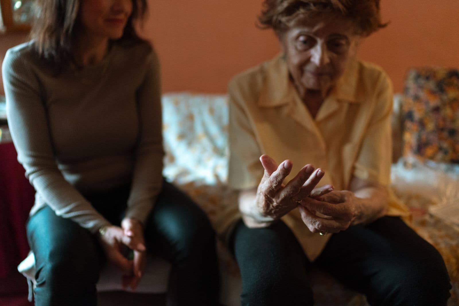 A carer providing thoughtful, skilled support at home